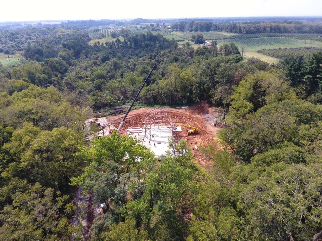 aerial view of Timbers as they are picked up the crane and placed
