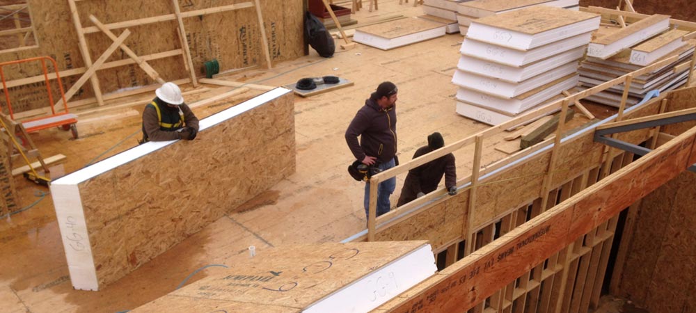 construction crew building with structural insulated panels