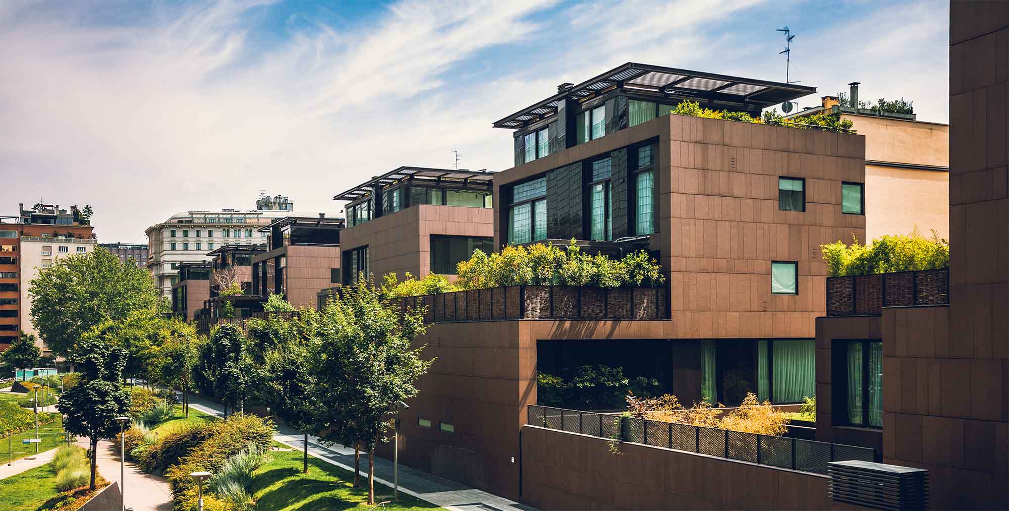 exterior of multi family buildings with trees